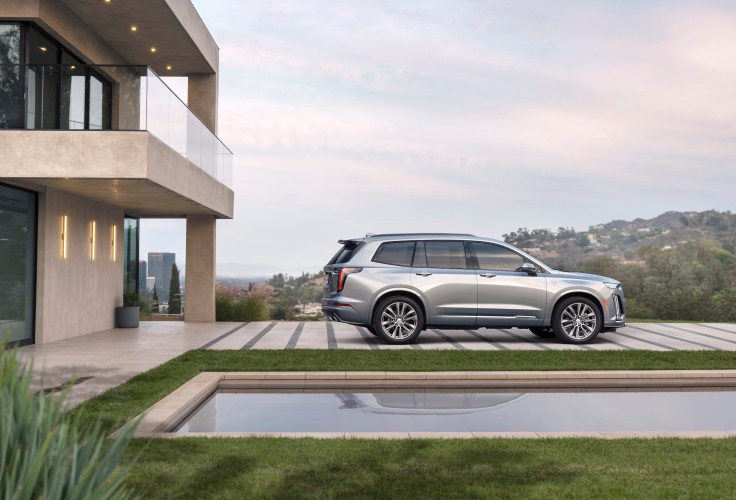 The Cadillac XT6 Sport is defined by darker accents and more aggressive, performance-inspired details, including available 21-inch wheels.